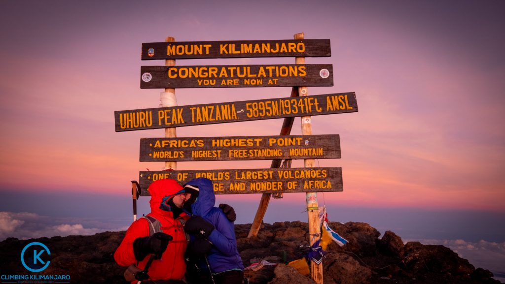 Mount Expeditions in Tanzania at Mount Kilimanjaro Summit with Couples on the picture